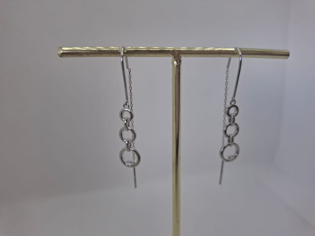 Earring: Dangling String Earrings with Diamante Detail